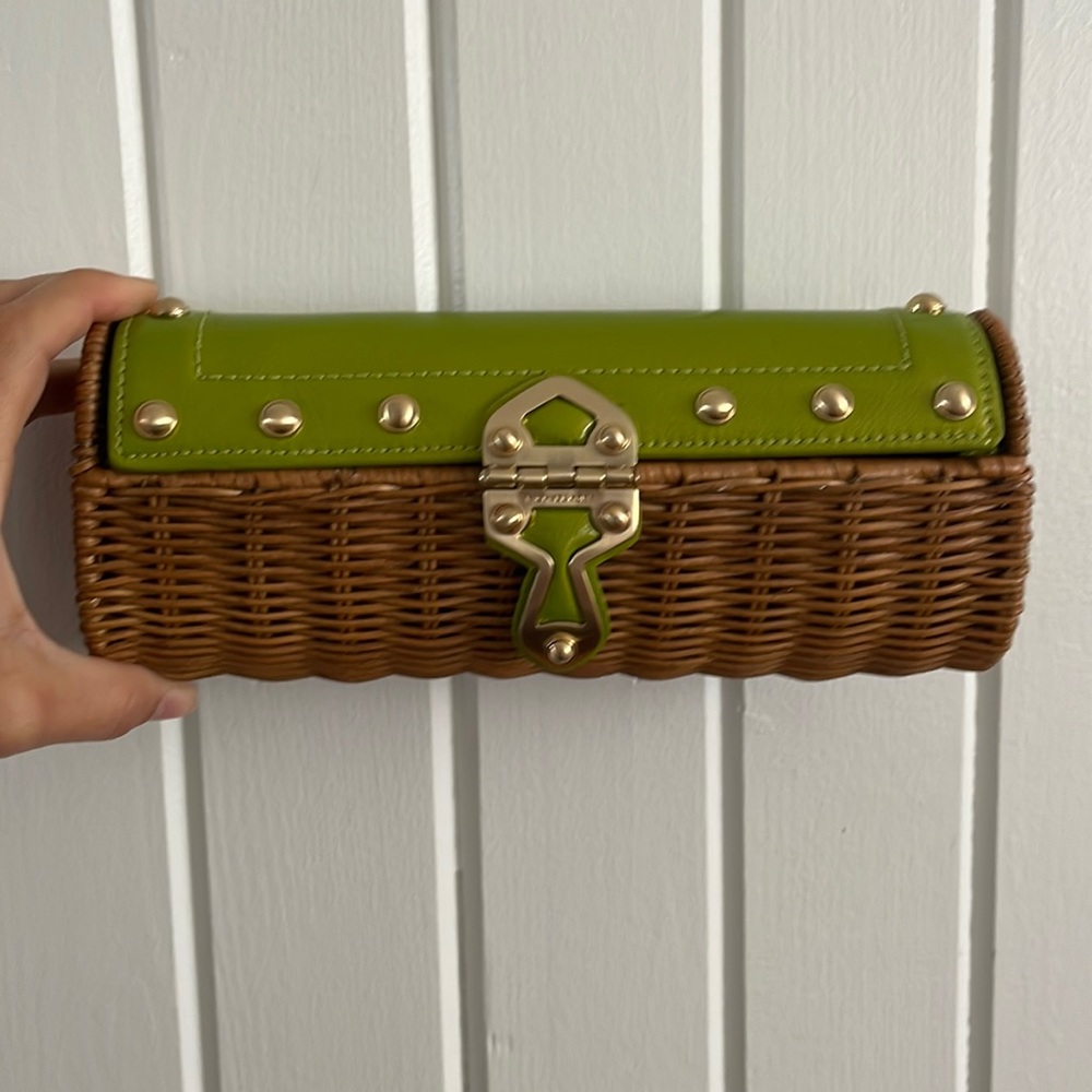 Michael Kors green wicker clutch with gold embellishments